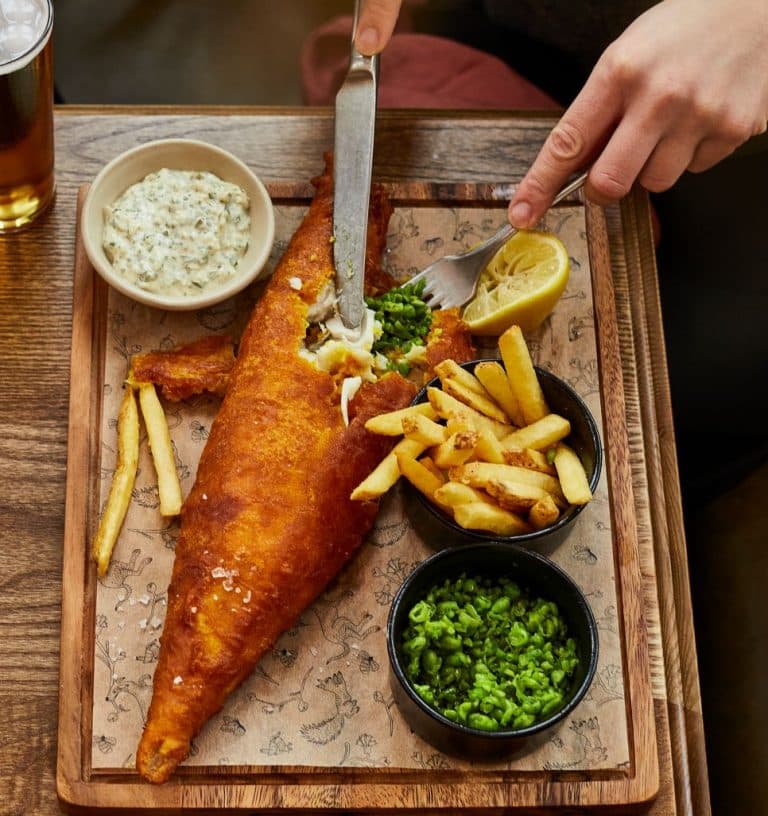 Cover Image for Complimentary Fizz when you order Fish and Chips at The British Queen!