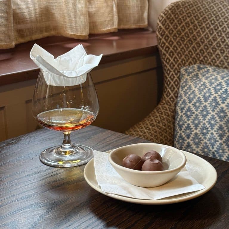 Cover Image for Compliment Truffles when you order Rémy Martin VSOP Cognac at The British Queen